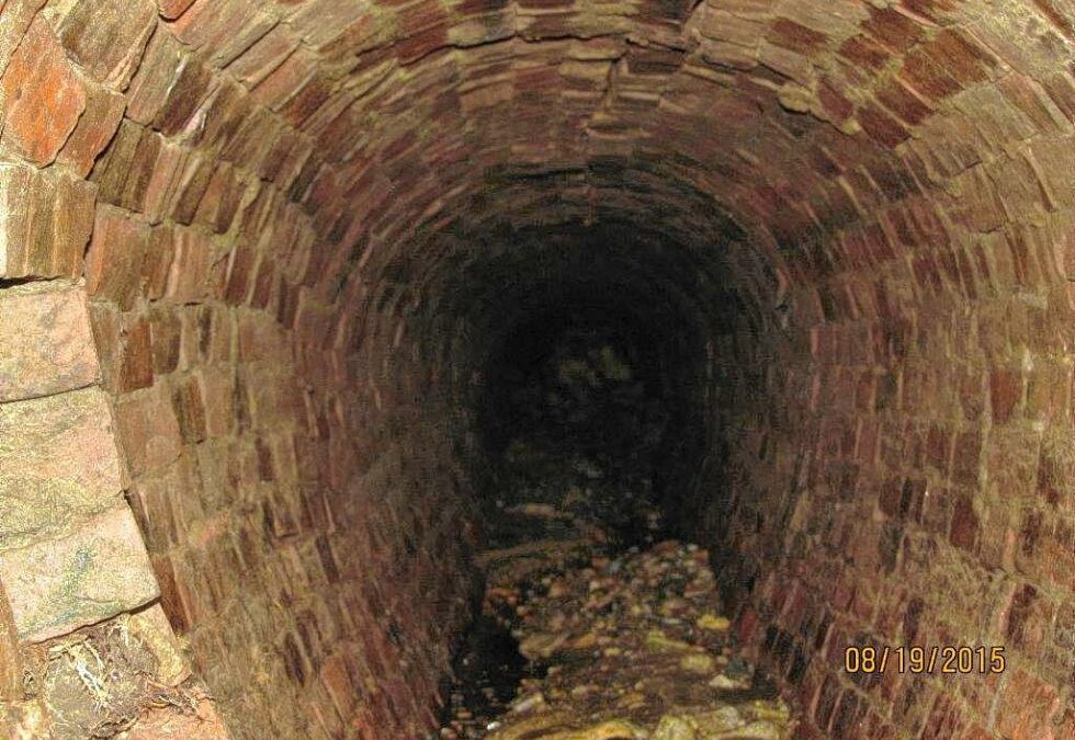 Courtesy photo by N.H. Department of Transportation The century old water pipe, made of brick and mortar, that led to the sinkhole on I-93 on Aug. 19, 2015.