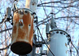 The cone-shaped object on top of the right transformer on Route 3 in Boscawen near the border with Concord makes it so that squirrels can't climb up them and cause an outage.  (GEOFF FORESTER / Monitor staff) - GEOFF FORESTER | Concord Monitor