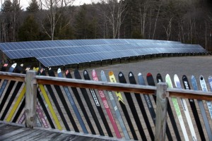 The solar panels at the Proctor Academy ski area parking lot are around the legnth of a football field and help with the ski operations of the area.   (GEOFF FORESTER / Monitor staff) - Concord Monitor