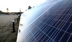 The solar panels at the Proctor Academy ski area parking lot are around the legnth of a football field and help with the area's ski operations.   (GEOFF FORESTER / Monitor staff) - Concord Monitor