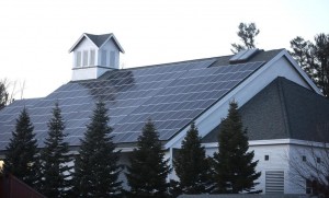 The solar panels at the Proctor Academy's Meeting House cover the entire south roof.   (GEOFF FORESTER / Monitor staff) - Concord Monitor