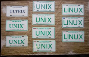 Some of Jon Hall's Unix-and-related license plates.
