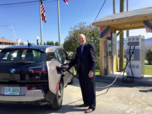 Crosby Peck, owner of Rogers Campground, demonstrates his new fast charging system for electric cars.