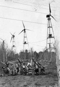 his photo shows residents and workers at Crotched Mountain Rehab Center walking under the working wind farm, in 1980 or 1981.