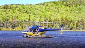 N.H. Fish and Game officers have been using helicopters to drop fish into remote lakes and ponds for years, but is that a good idea? New Hampshire Fish and Game Department