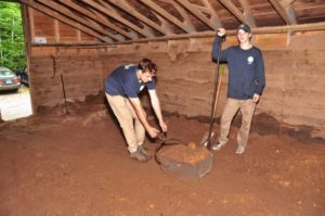 Pulling an ice block out of the ice house - sawdust is used as insulation. Courtesy photo