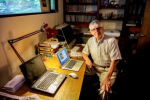 Tom Kurtz sits in his computer room in his home in Hanover, N.H., on Thursday, Aug. 9, 2018. Kurtz is one of two people that created the BASIC computer language and launched one of the first long-distance computer networks, the Dartmouth time-sharing system. (Valley News - August Frank) Copyright Valley News.