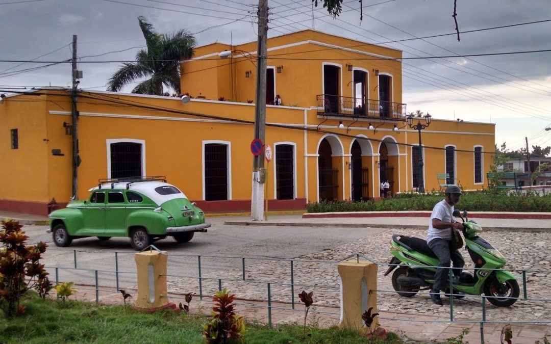 In Cuba, those old American cars share the road with Chinese electric motorcycles