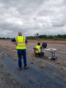 Bob Meyer (left) watches Manuel Isaza fly a drone at Concord Municipal Airport last week. Courtesy Rita Hunt / ArgenTech Solutions