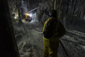 Water being pumped into trees during a freezing night as part of the Ice Storm Experiment at Hubbard Brook Experimental Forest. Joe Klementovich—Hubbard Brook Research Found