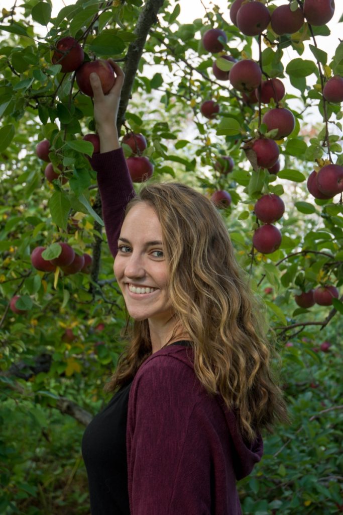 UNH graduate student Liza DeGenring is investigating the development of new tools to manage apple scab for Northeast farmers. 