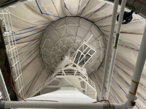 The 13-meter antenna at the New Boston Space Force Station after it was covered by a new dome in July. The inflatable dome, transparent to radio waves, protects the antenna from the elements and hides its orientation so it’s not clear which satellites it is tracking. Courtesy of US Space Force