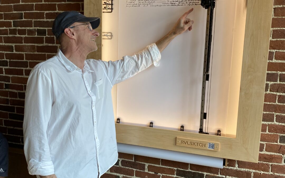A wall-mounted printer becomes self-creating artwork