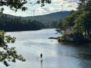 Antrim Wind as seen from White Birch Point on Gregg Lake in Antrim. Credit: JESSECA TIMMONS/Ledger-Transcript